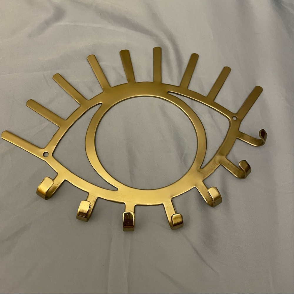 Gold metal eye necklace organizer